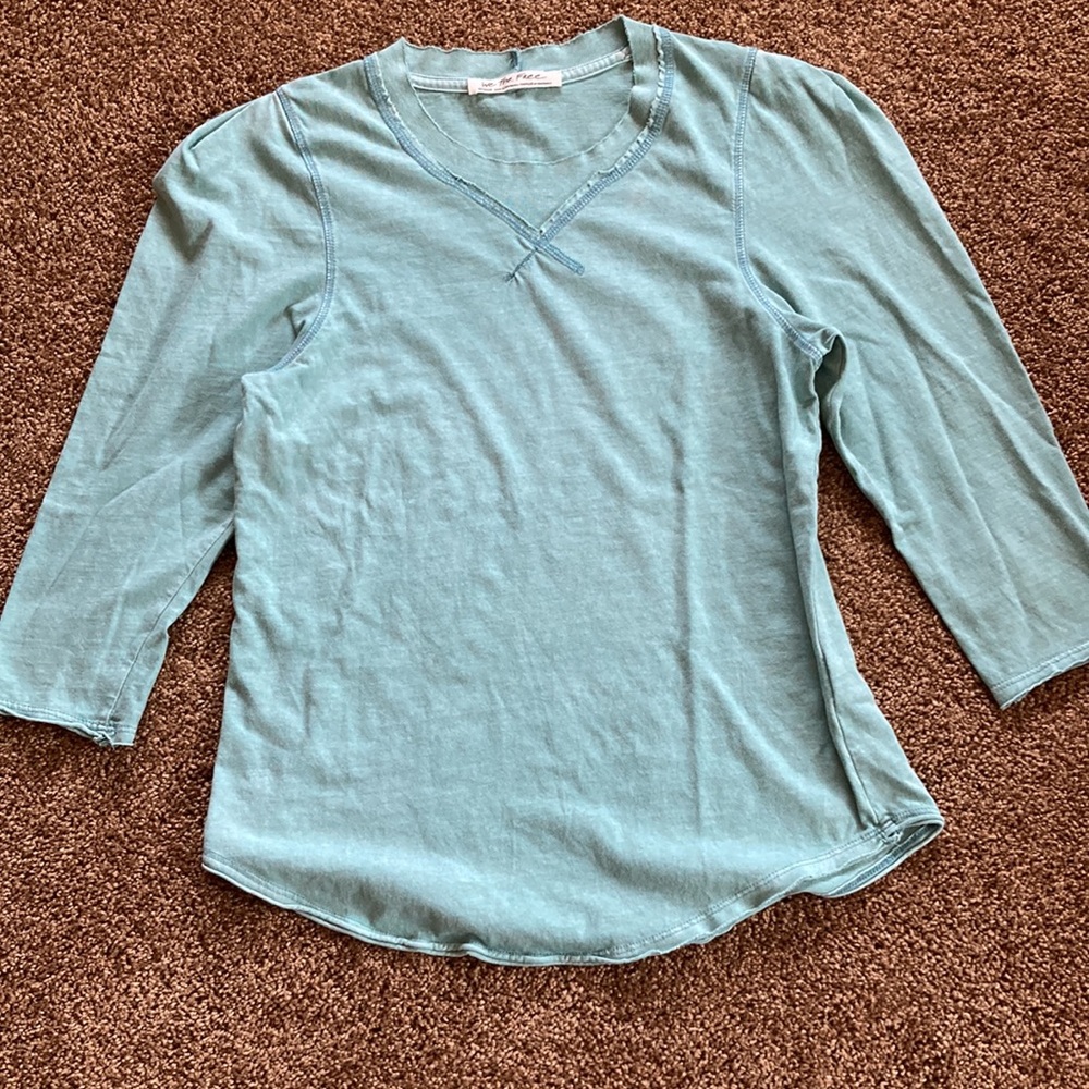 WE THE FREE. Beautiful sage, green light weight top, three-quarter inch sleeves.
